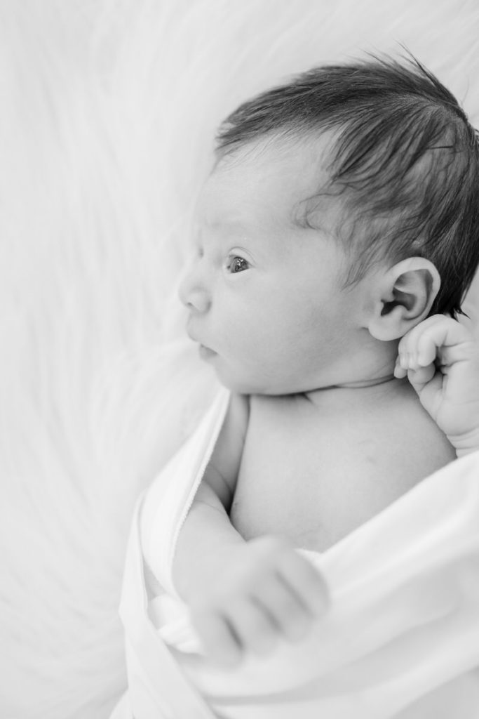 black and white closeup of newborn