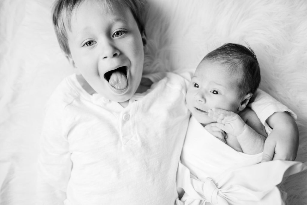Naperville Newborn Photographer, big brother holding baby sister